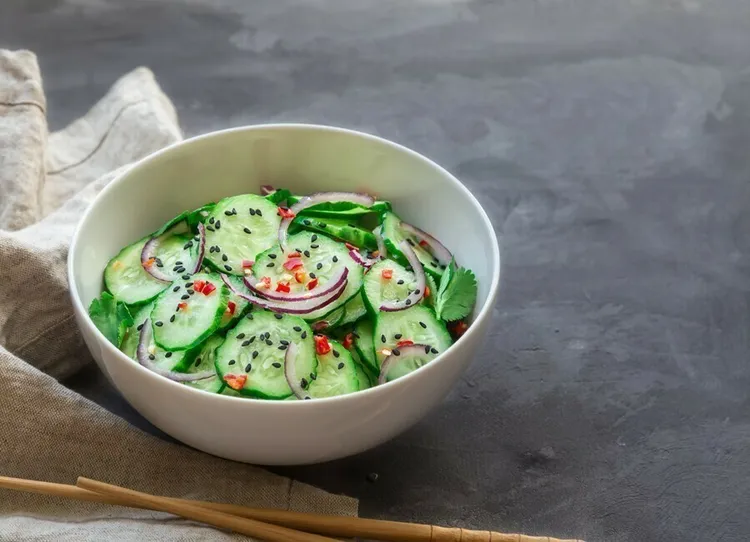 Thai cucumber salad with peanuts and onions