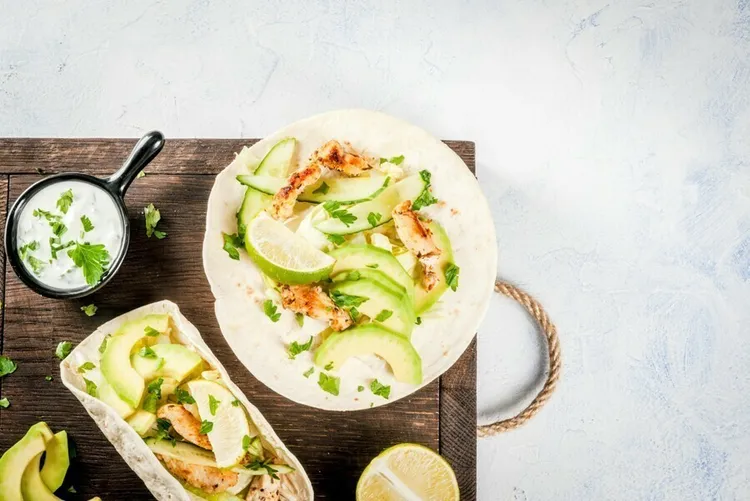 Tilapia tacos with avocado and lime