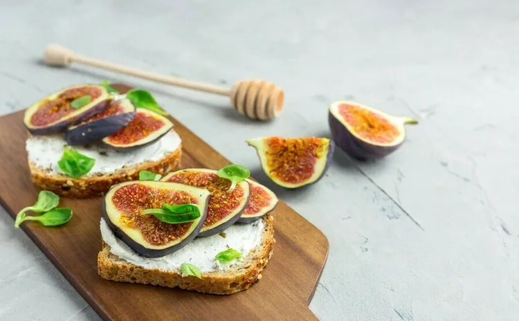 Toasted whole-wheat fig sandwich with ricotta and sesame seeds