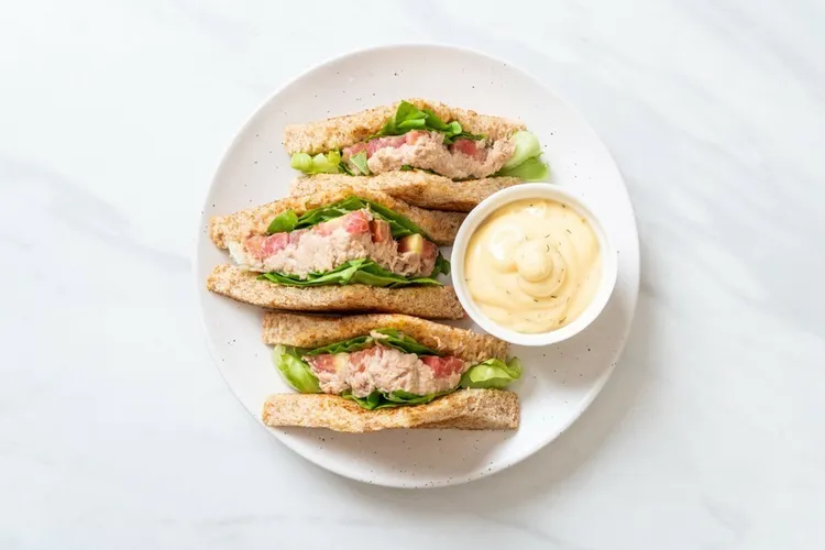Tuna and celery sandwich with dill and parsley