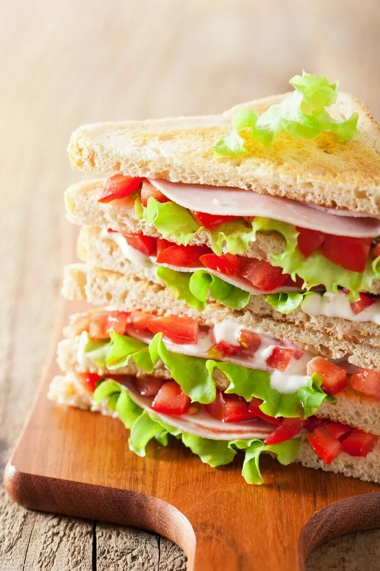 Turkey ham sandwich with lettuce and tomato