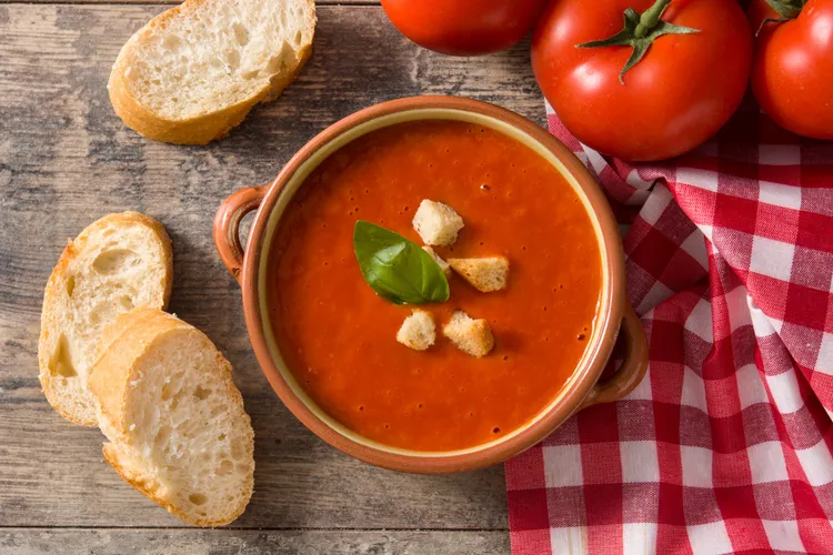 Tomato soup with garlic and basil-crusted bread
