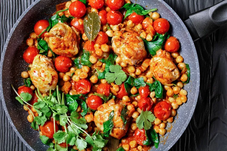 Roast chicken with garbanzo beans, tomatoes and paprika