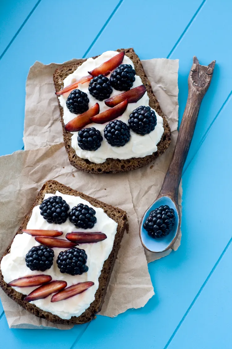 Toast with berries, basil & cream cheese