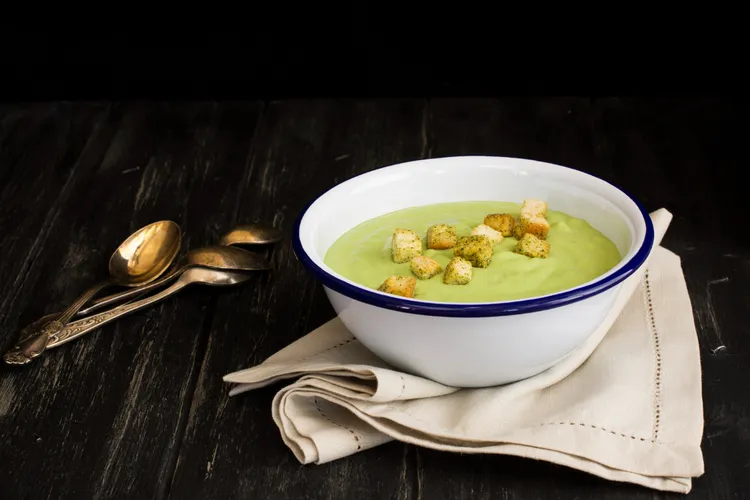 Zucchini basil soup with spinach, garlic and nutmeg