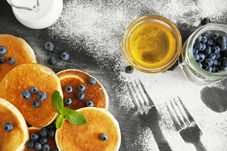 Blueberry pancakes with creme fraiche & orange syrup