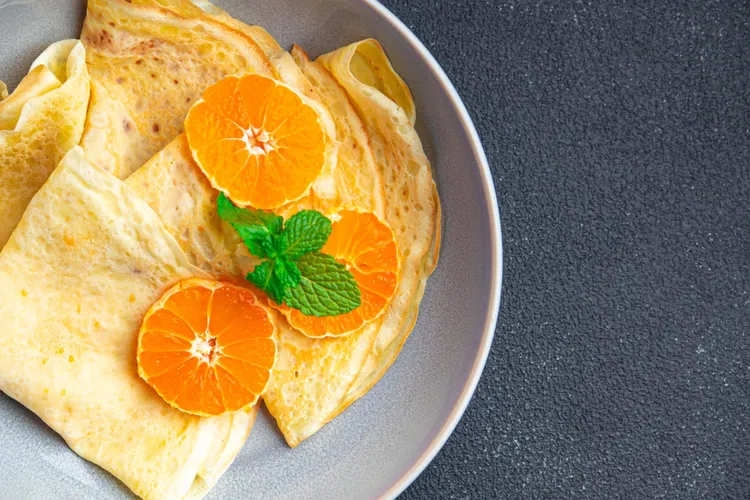 Crepes with cinnamon oranges