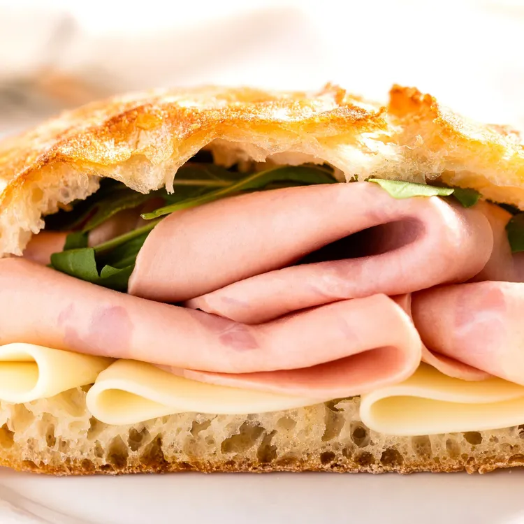 Turkey, provolone and sprout sandwich