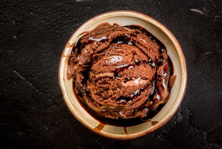 Creamy chocolate ice-cream with dark chocolate sauce