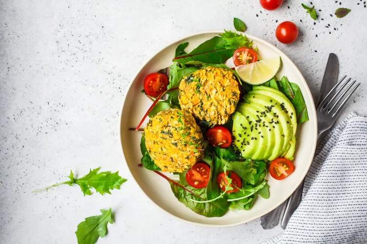 Fast pea and dill fritters with avocado salad