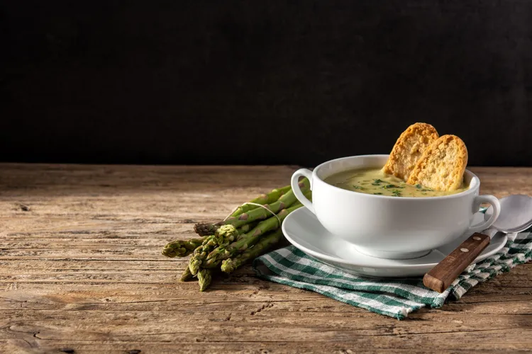 Light pea and asparagus soup with parmesan pastries