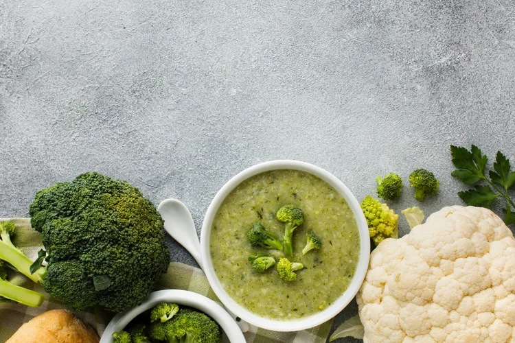Spiced cauliflower and broccoli soup with cheddar cheese