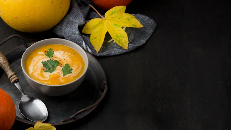 Thai-style pumpkin soup with coriander pesto
