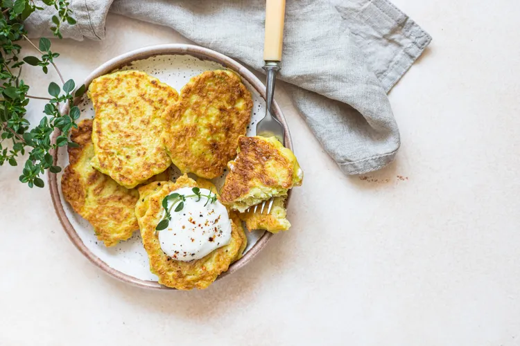 Zucchini and pumpkin fritters with poached eggs