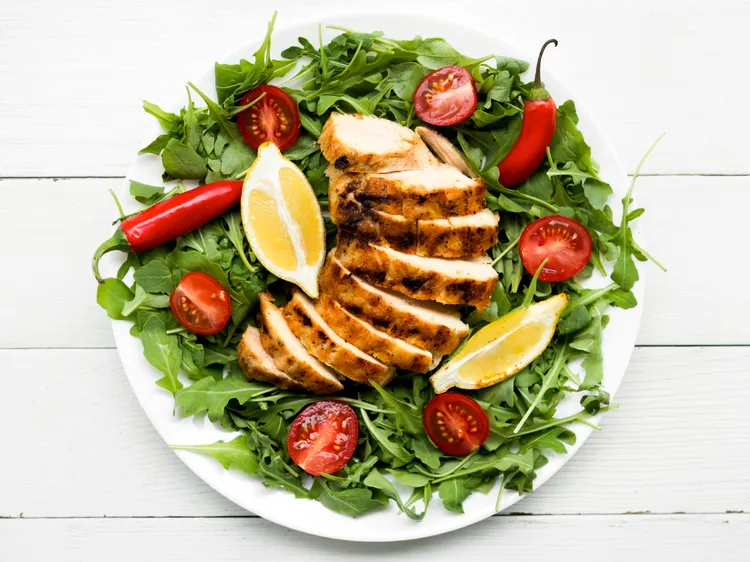 Lemon grilled chicken with roast tomato salad