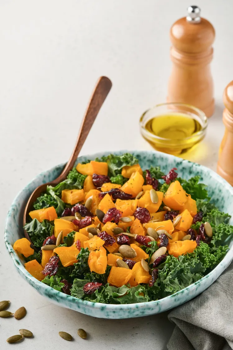 Roast pumpkin salad with cranberries and pistachio