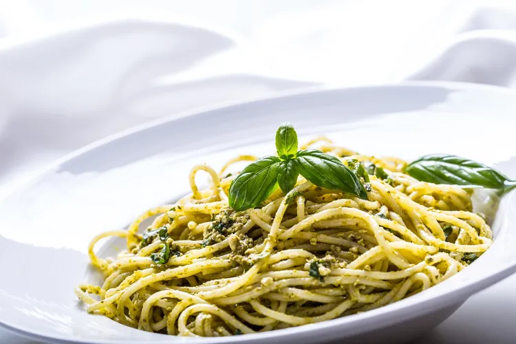 Spaghetti with olive and mint pesto