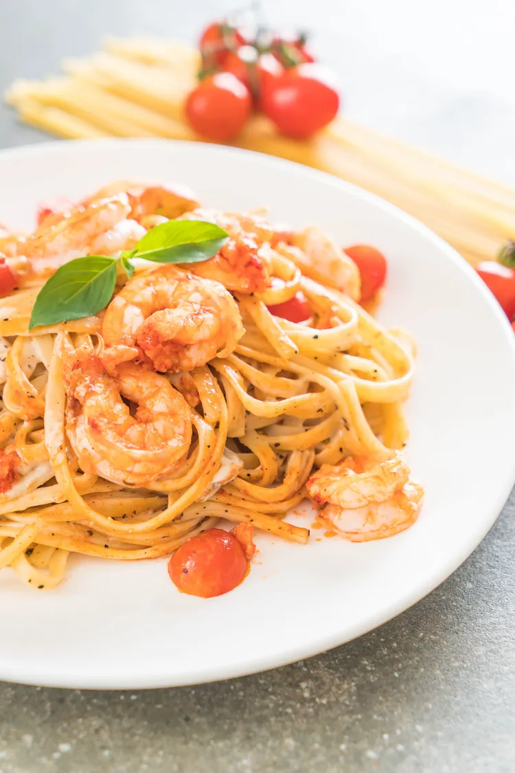 Spaghetti with shrimps, fresh tomato, garlic and parsley