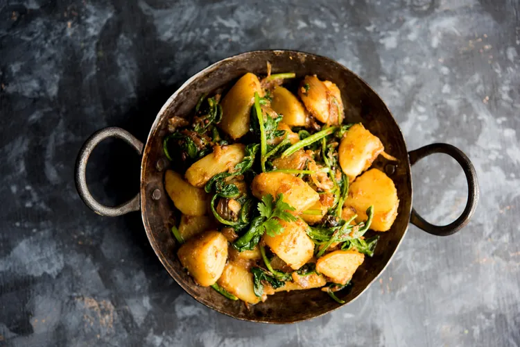 Warm grilled potato salad with olives and parmesan
