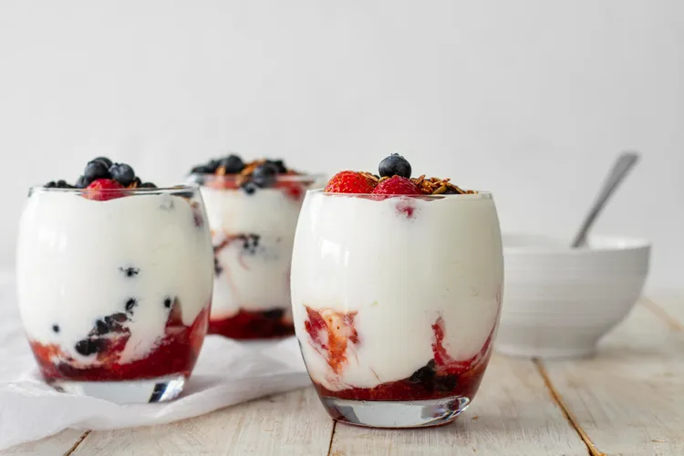 Berries in syrup with vanilla yoghurt
