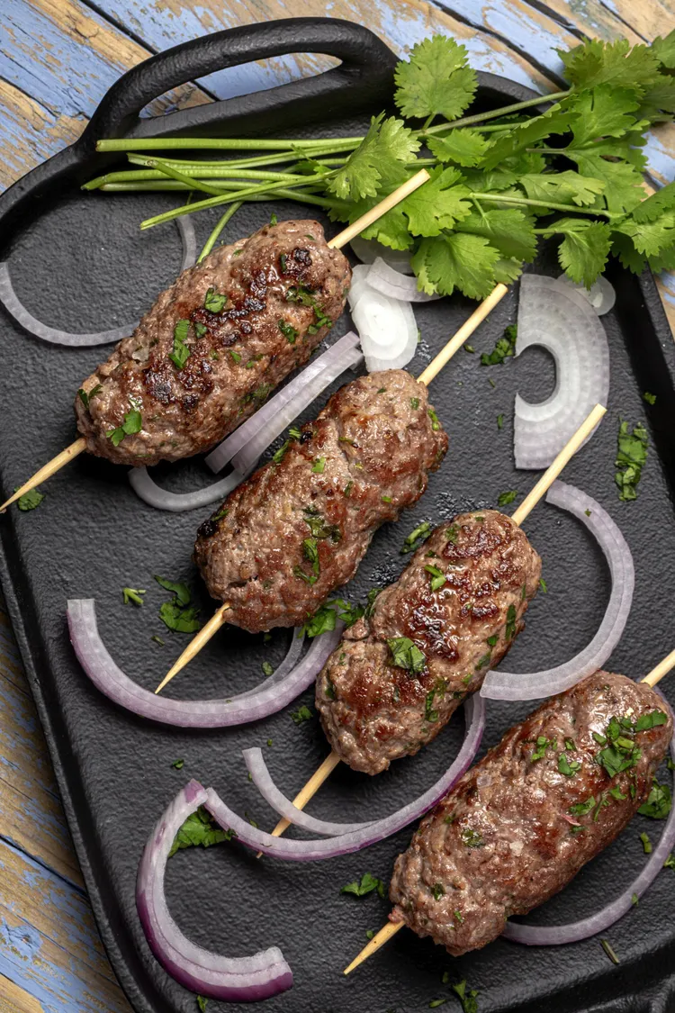 Curtis stone's moroccan lamb skewers with couscous