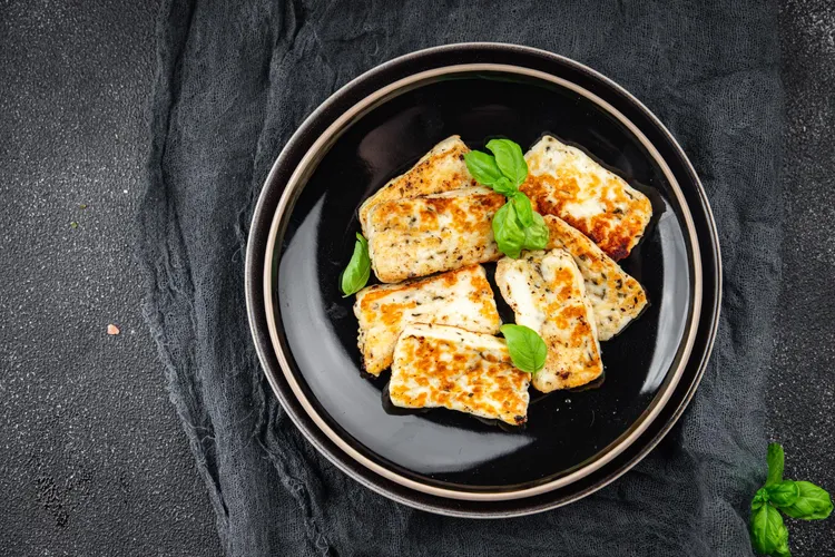 Fried greek cheese with honey, oregano and walnuts