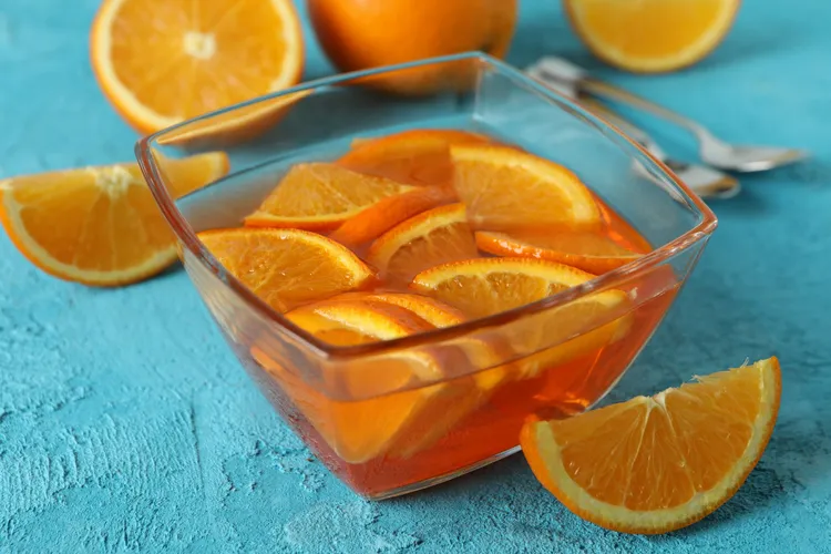 Oranges in spiced tea syrup