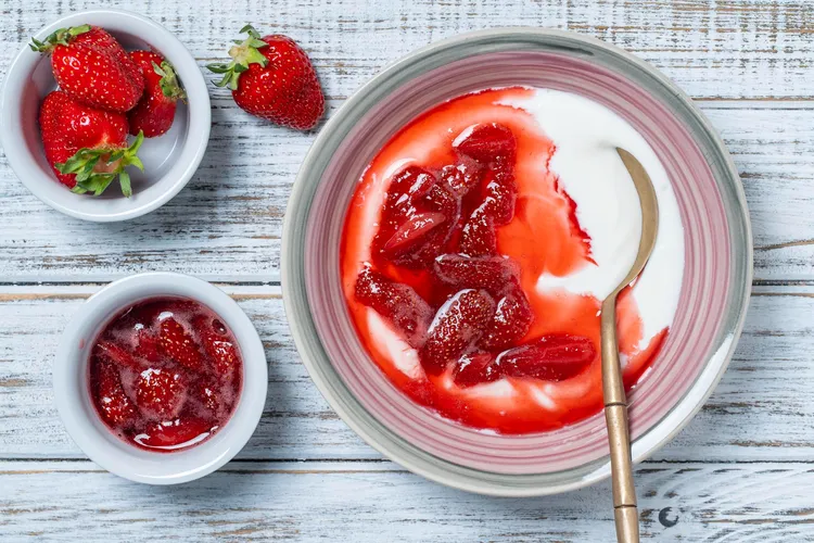 Strawberries in syrup with honey yoghurt