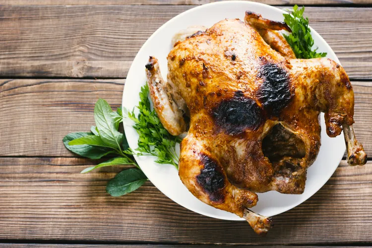 Roast chicken with pistachio and cranberry stuffing