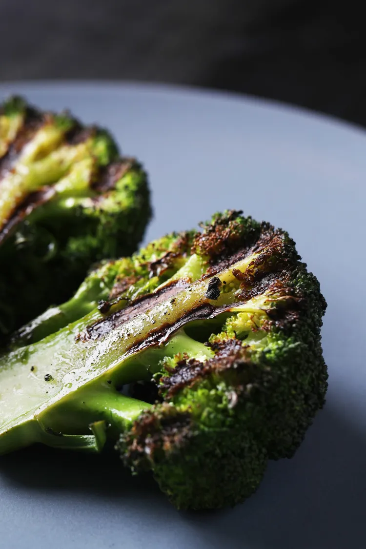 Broccoli steaks with charred lemon dressing
