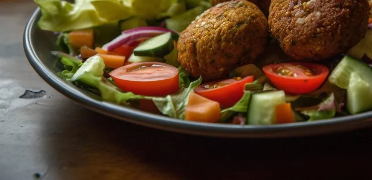 Sweet potato and coriander felafels with tomato herb salad