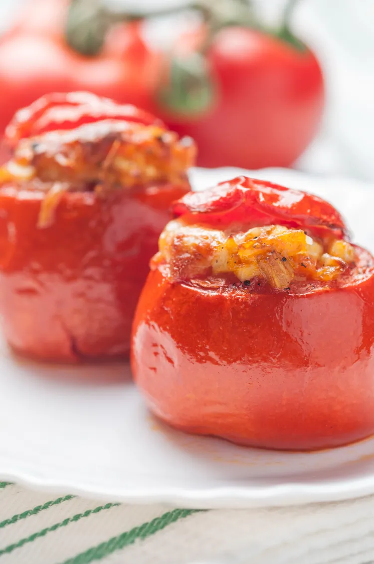 Herb couscous stuffed tomatoes