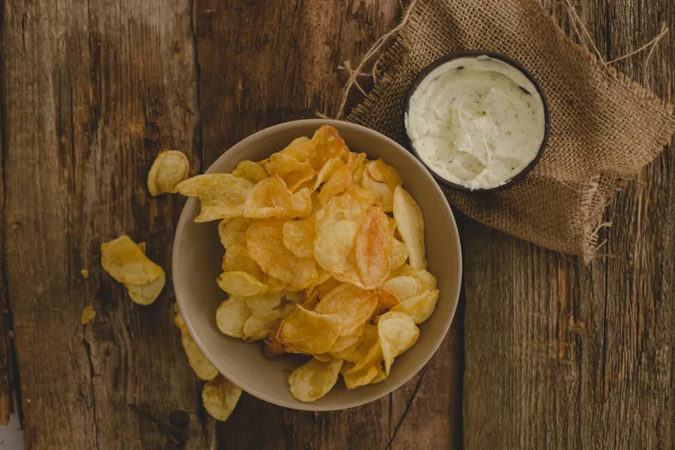 Lemon-salted chips with roasted garlic cream