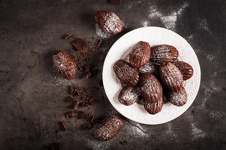 Coconut and sesame madeleines with choc drizzle