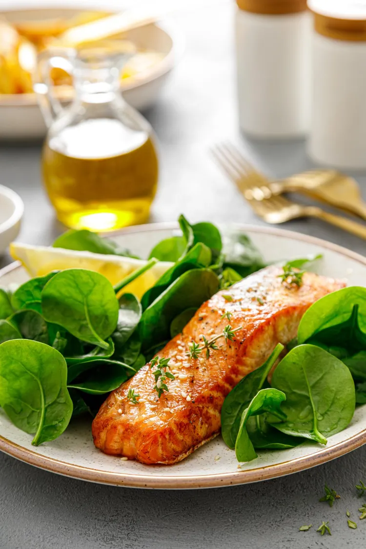 Baked maple-glazed salmon with wilted spinach