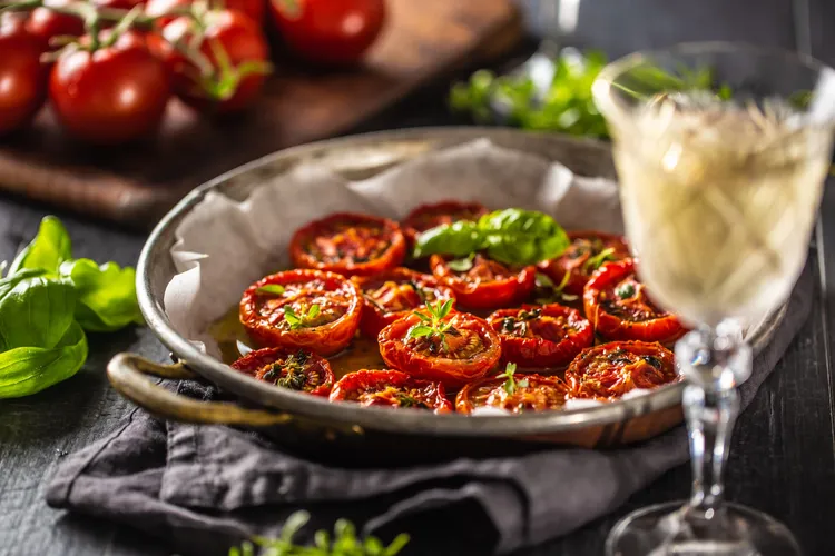 Mixed tomatoes with basil oil