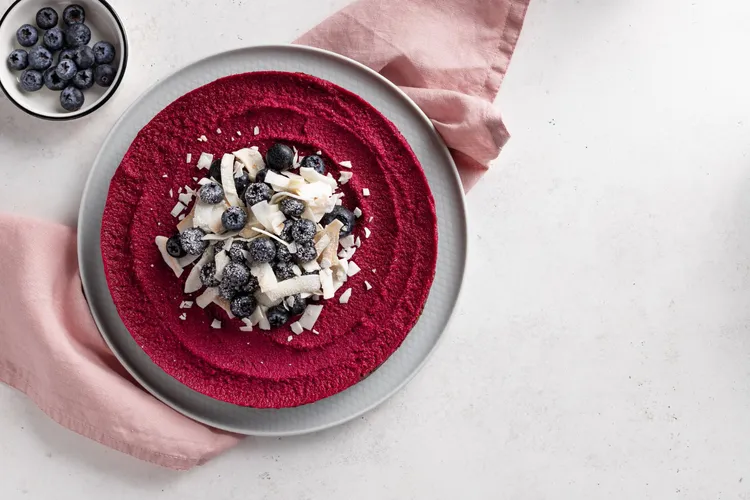 Raw vegan beet cashew cake with dates, almonds and coconut