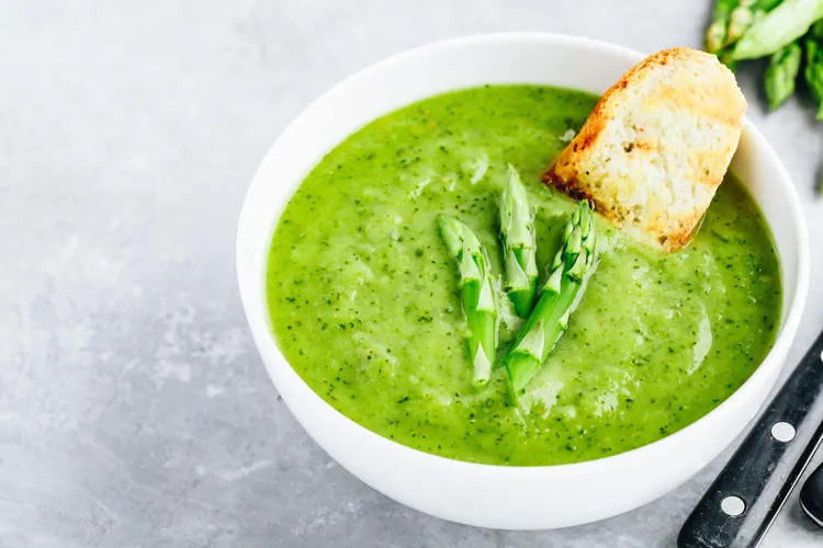Asparagus and onion soup with mustard and lemon zest