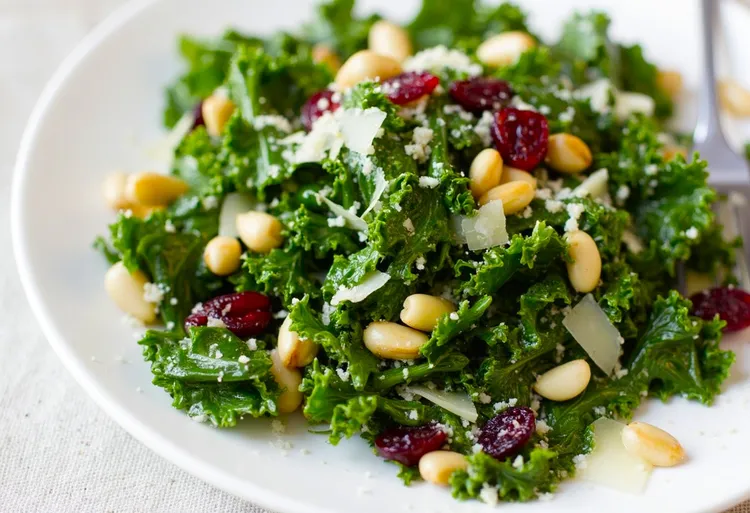 Kale salad with balsamic, pine nuts, cranberries and parmesan
