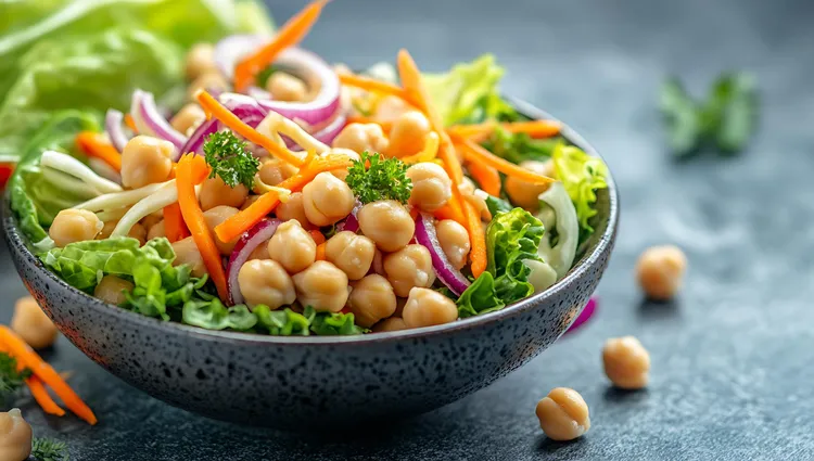 Vegan chickpea salad with carrots, celery and capers