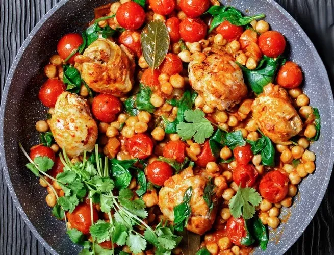 Roast chicken with garbanzo beans, tomatoes and paprika