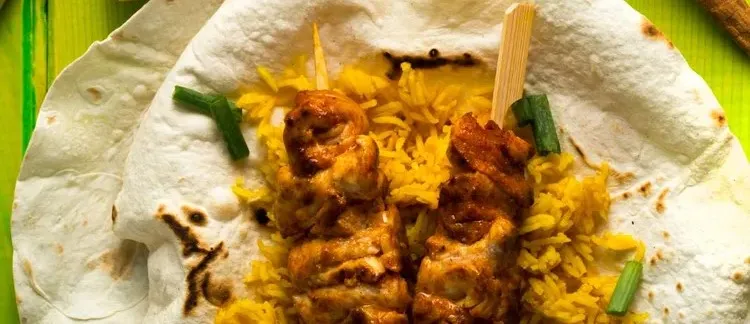 Chicken skewers with turmeric rice