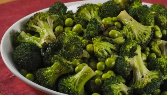 Roasted broccoli and peas with garlic dressing