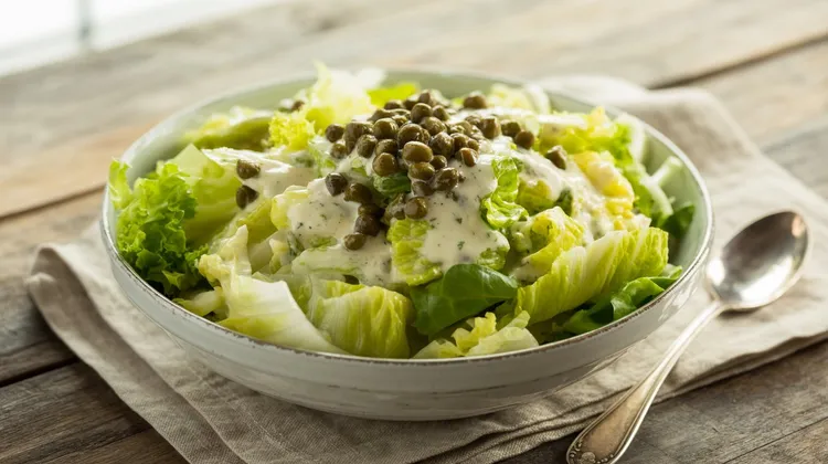 Iceberg lettuce with creamy caper dressing