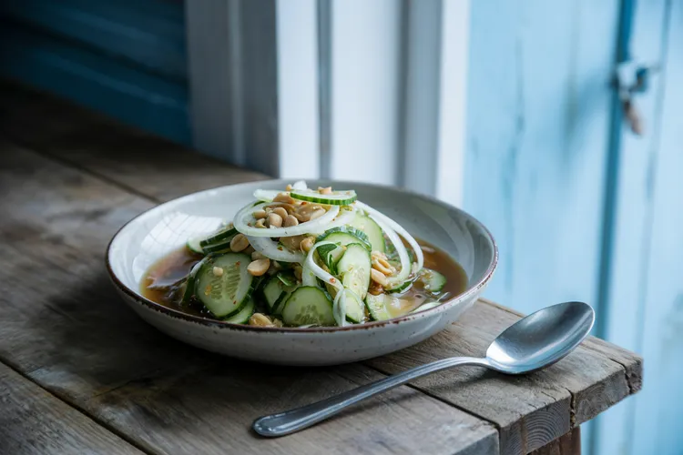 Thai cucumber salad with peanuts and onions
