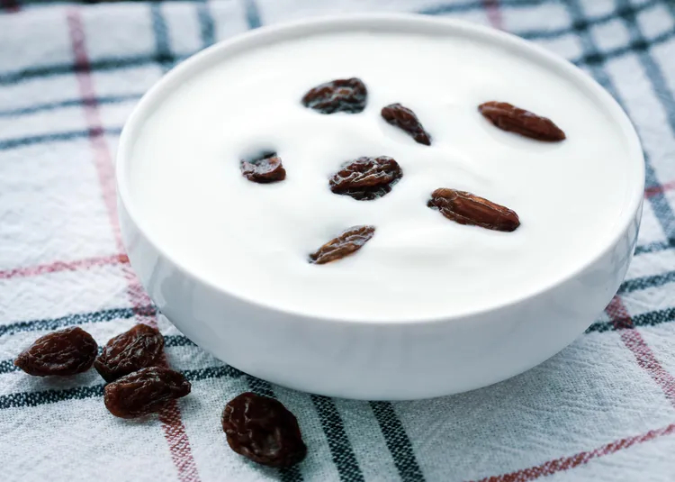 Peanut butter and raisin greek yogurt breakfast bowl