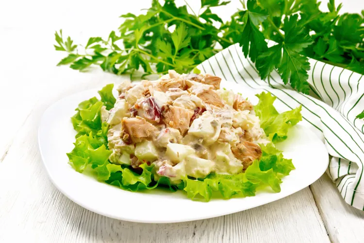 Potato salad with chicken and prosciutto